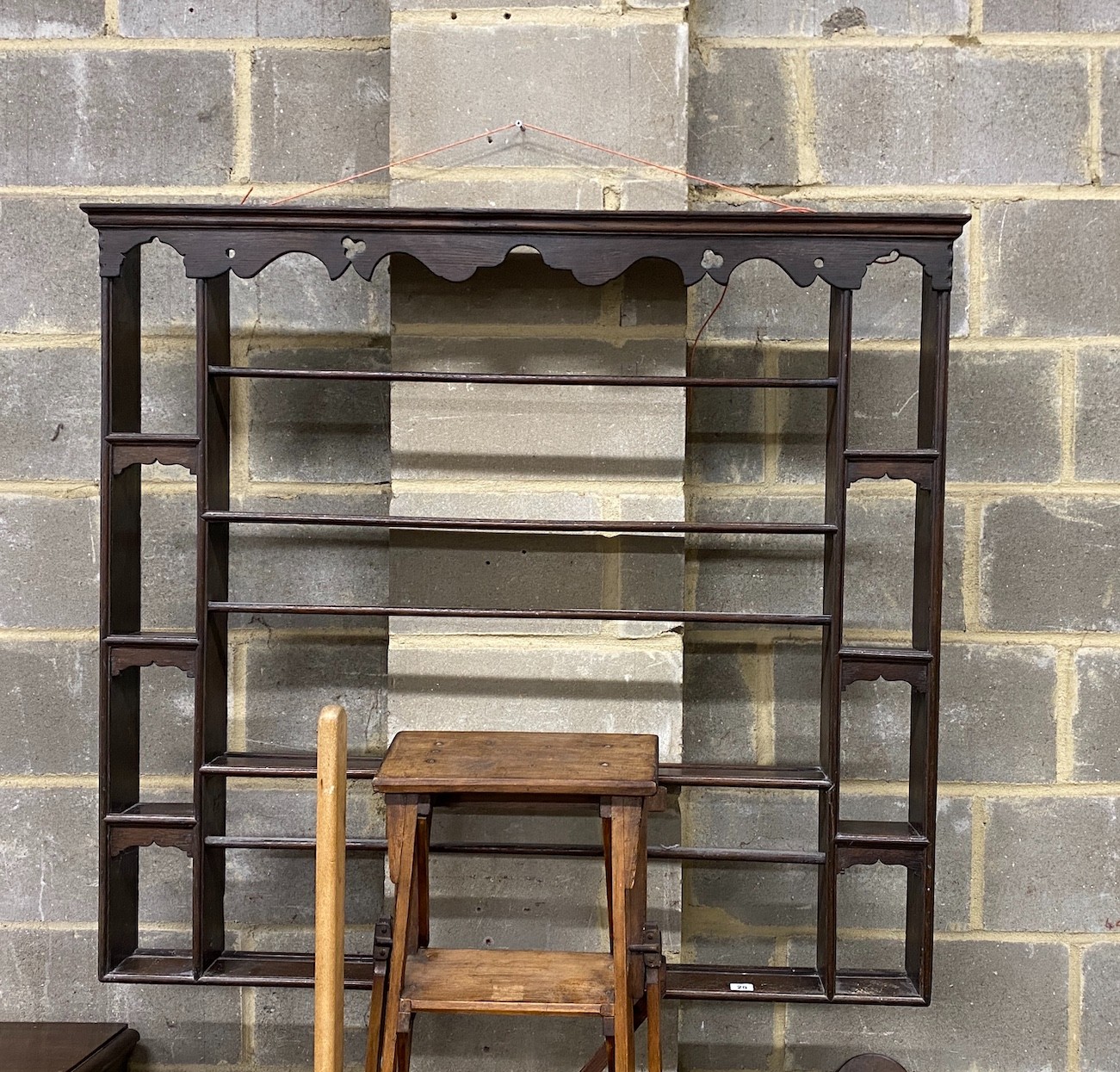 A small 18th century style oak plate rack, width 118cm, depth 11cm, height 108cm